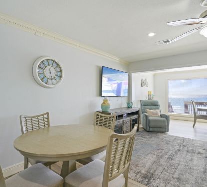 Coastal inspired decor and soft natural light create a calm retreat where everyone can relax together without feeling crowded.