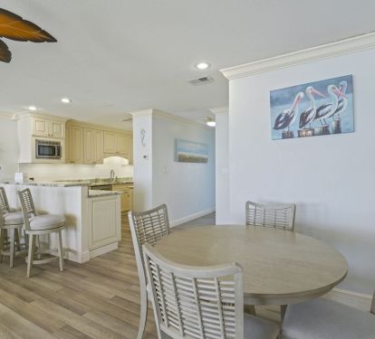 From morning coffee at the breakfast bar to movie nights on the large screen, this space keeps everyone connected.