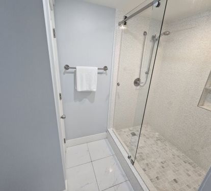 Walk in shower of second master suite