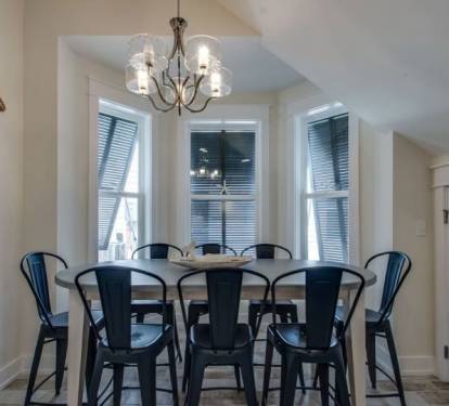 Large Dining Table with Bay Windows and Seating for 8