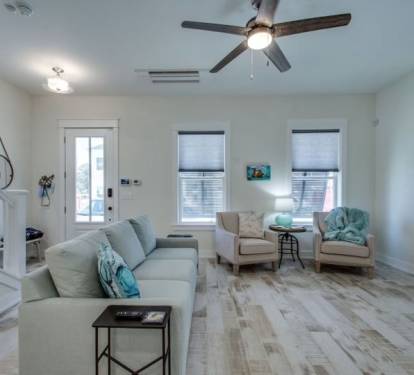 Living Room Ready for Peaceful Relaxation with Large Flat Screen