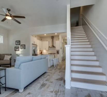 Stairs with Safety Railing Leading to Upstairs Living Room
