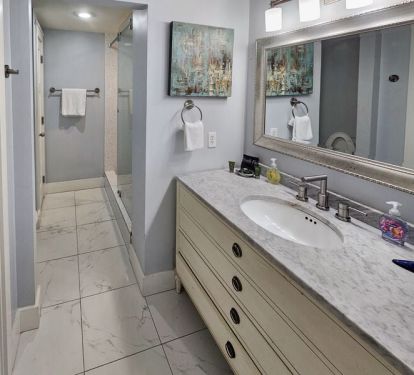 Second master bathroom with separate vanity area