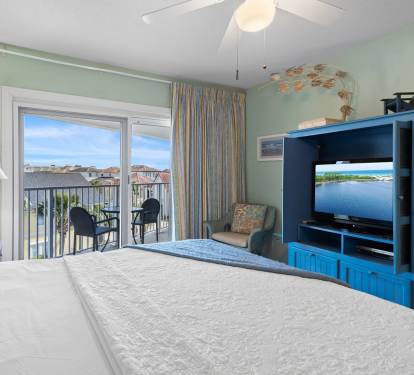 A cozy space for kids or extra guests, complete with its own TV and plenty of storage.