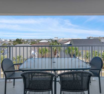 Enjoy your morning coffee or evening wine in peace with a breezy second seating area off the main bedroom.