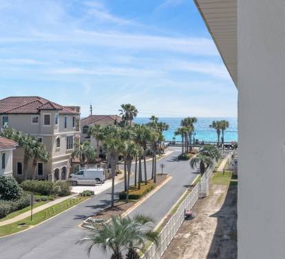 Sit back, relax, and take in the palm-lined street and sparkling Gulf beyond - just steps from Maravilla-s private beach access.
