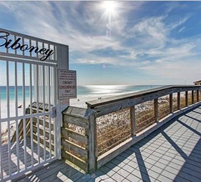 Private gated beach access - just steps from your condo to the sugar-white sand.