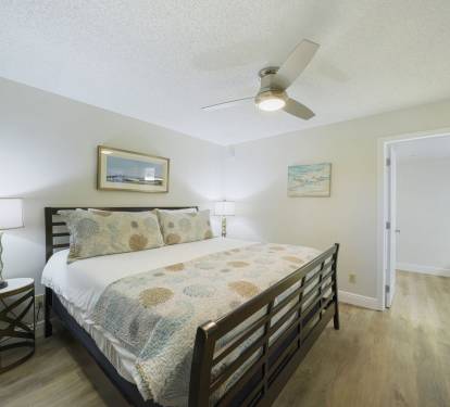 Spacious master bedroom with king bed at Cabana Club beachfront condo