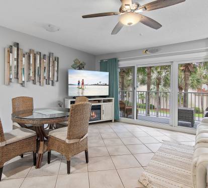 Open living and dining space with natural light at Maravilla 4205, a Miramar Beach vacation rental near the Gulf.