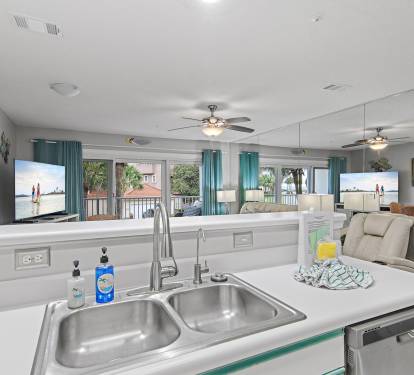 Kitchen with open layout overlooking the living room at Maravilla 4205