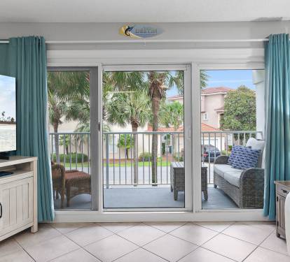 Living room with sliding doors opening to balcony at Maravilla 4205