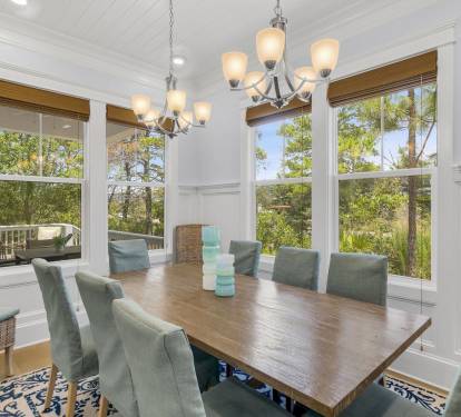Eight-seat table with natural light pouring in. This is where your group's best memories happen. Picture yourselves here right now.