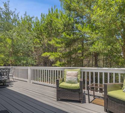 Real seating, real dining space, room to move around. This deck gets used every single day of your stay at Sea-Renity.