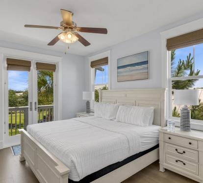 King bed, ceiling fan, private balcony. You deserve a room where you feel taken care of and actually rest well every night.
