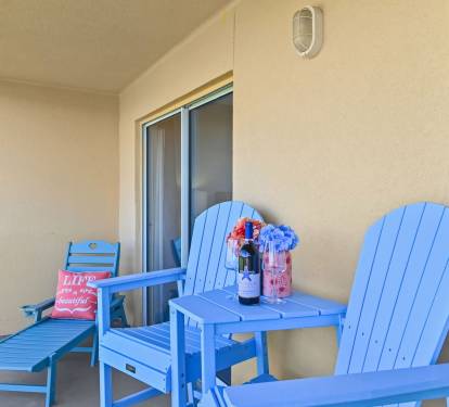 Relax in coastal style with comfy balcony seating, perfect for morning coffee or evening wine.