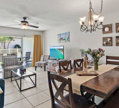 Gather for meals or movie nights in this bright open living space with direct patio access. Your last-minute Miramar Beach getaway is waiting-book now before it-s gone!