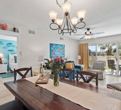 Relax in style with plush seating, a spacious dinning table, and a warm coastal vibe. Perfect for family nights after the beach. Availability is limited-book your last-minute Miramar Beach condo now!