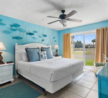 Master bedroom with patio access.
