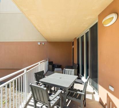 Step outside from the living room or bedrooms to enjoy the gentle sea breeze and coastal views from the private balcony.
