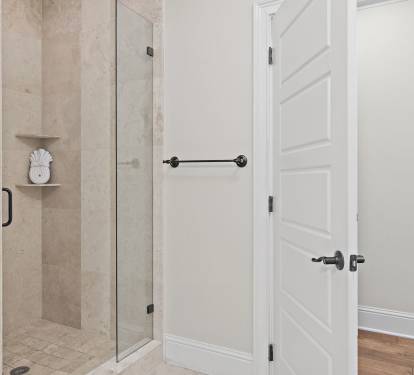 Unwind in style with a large walk-in shower and serene spa atmosphere.