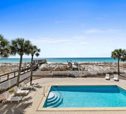 Balcony over looking the property pool and beautiful water