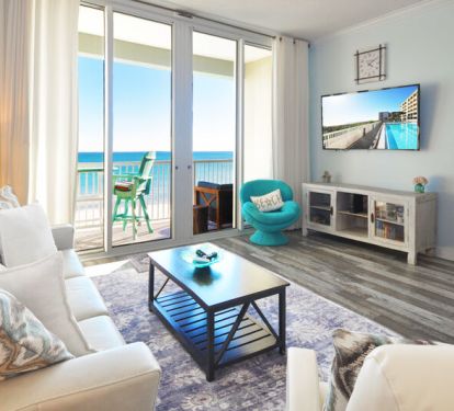 Living Room with Balcony - Waters Edge Resort unit 613 Okaloosa Island Fort Walton Beach Vacation Rentals by Sunset Resort Rentals