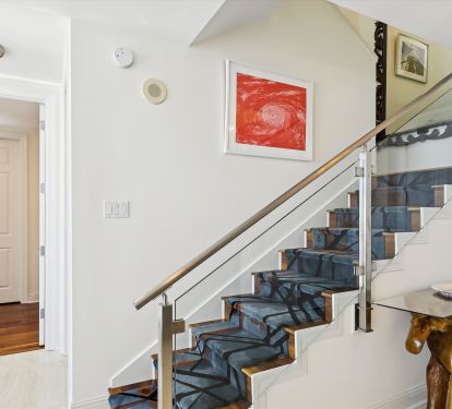 Main level stairs leading to upstairs