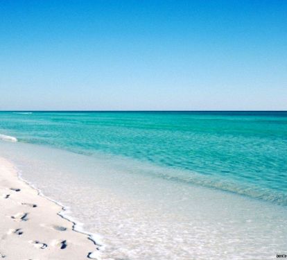 Emerald green waters, and sugar white beaches.