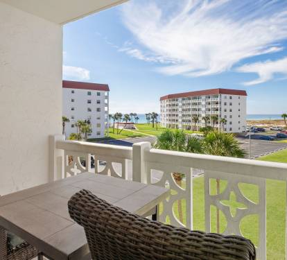 Balcony overlooking the gulf from a distance.