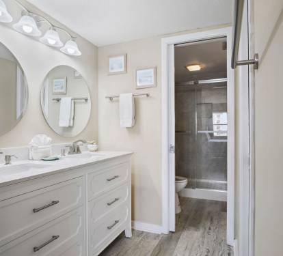 vanity area to walk in the bathroom