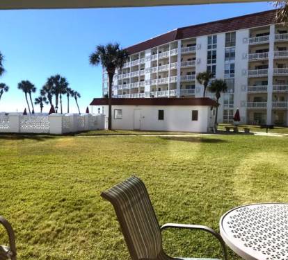 Living Room View - Just steps from the Pool and Beach