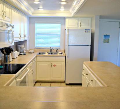 Looking towards the entry and kitchen from the high bar.