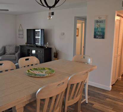 This shot shows the dining room and entries into the two bedrooms.