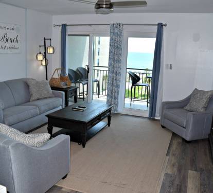 Living room with sliding glass doors to balcony