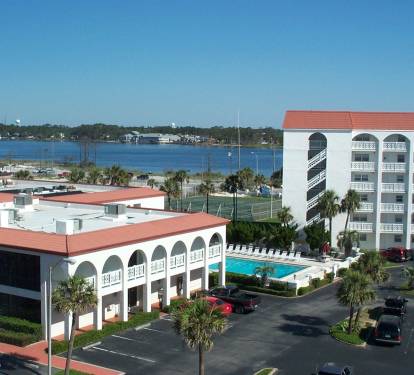 Looking to the Intra-Coastal Waterway and the front pool from Building # 1. You can see the two tennis courts also.