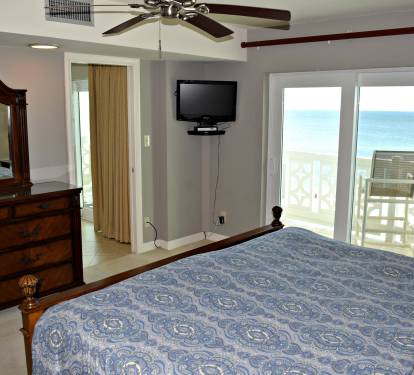 Master bedroom has new sliding glass doors that lead you to the balcony.