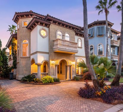 Welcome to Tuscan Charm, a 4 bedroom 3 1/2 bath home with 2274 sq ft of casual elegance in a private gated community.