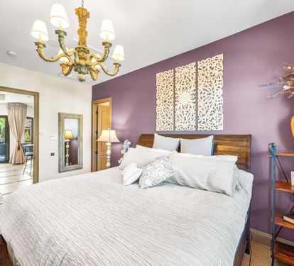 Sleep like royalty in the primary king bedroom on the 2nd floor with an en suite bathroom.