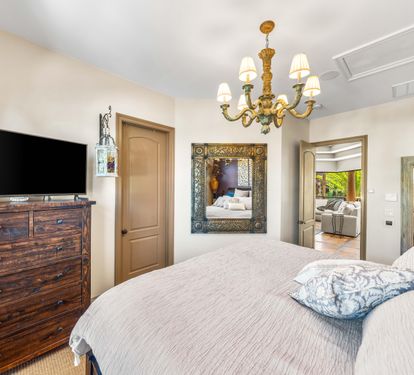 Plenty of storage with the large dresser and walk-in closet.