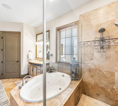 Second Floor Primary King Bedroom Jetted Tub and Walk In Shower
