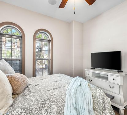 This queen bedroom has a 42" smart tv.