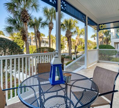 Dine under the stars or sun — this patio's perfect for meals, drinks, and good vibes.  The Frangista Beach pool is just across the street.