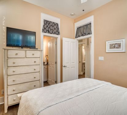 You will enjoy relaxing in this queen bedroom with a 32" tv.