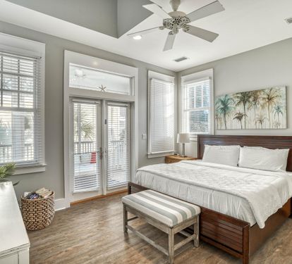 Second floor Big king bed, private screen porch, and an ensuite that hits different — this room’s straight fire.   Lots of space, privacy, good reads, & a 42" cable tv/DVD player.