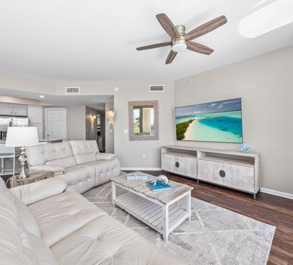 Large Open Living Room with Reclining Leather Chairs