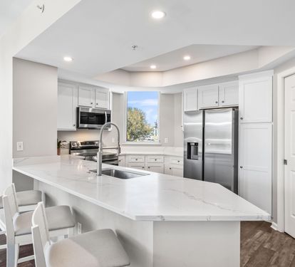 Open Kitchen with Bar Seating for 3