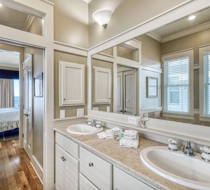 Primary Ensuite Bathroom with Double Travertine Balconies