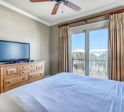 3rd Floor Guest Bedroom with King Bed  Overlooking the Frangista Beach Community with Ensuite Bathroom