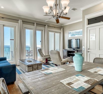 Dining and Cooking with Gulf Views! 2nd floor living area that opens up to the private covered balcony.   Comfortable furnishings and picnic style dining table.