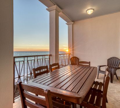 Enjoy sunsets while dining al fresco just off the 2nd  floor living area.